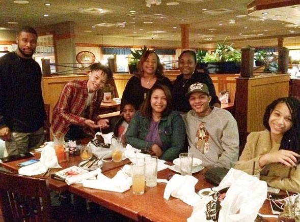 Messiah enjoying a moment with his family.